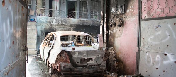 Burned car in Mosul - Sputnik International