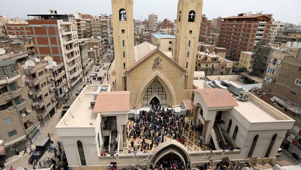 A general view is seen as Egyptians gather by a Coptic church that was bombed on Sunday in Tanta, Egypt, April 9, 2017 - Sputnik International