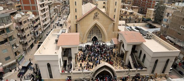 A general view is seen as Egyptians gather by a Coptic church that was bombed on Sunday in Tanta, Egypt, April 9, 2017 - Sputnik International