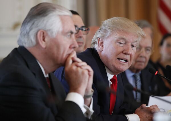 President Donald Trump, joined by Secretary of State Rex Tillerson, left, speaks during a bilateral meeting with Chinese President Xi Jinping at Mar-a-Lago, Friday, April 7, 2017, in Palm Beach, Fla President Donald Trump, joined by Secretary of State Rex Tillerson, left, speaks during a bilateral meeting with Chinese President Xi Jinping at Mar-a-Lago, Friday, April 7, 2017, in Palm Beach, Fla - Sputnik International