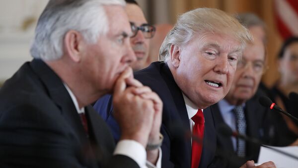 President Donald Trump, joined by Secretary of State Rex Tillerson, left, speaks during a bilateral meeting with Chinese President Xi Jinping at Mar-a-Lago, Friday, April 7, 2017, in Palm Beach, Fla - Sputnik International