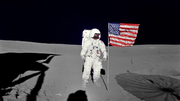Apollo 14 Mission image - Astronaut Edgar D. Mitchell, lunar module pilot for the Apollo 14 lunar landing mission, stands by the deployed U.S. flag on the lunar surface during the early moments of the first extravehicular activity (EVA-1) of the mission. - Sputnik International