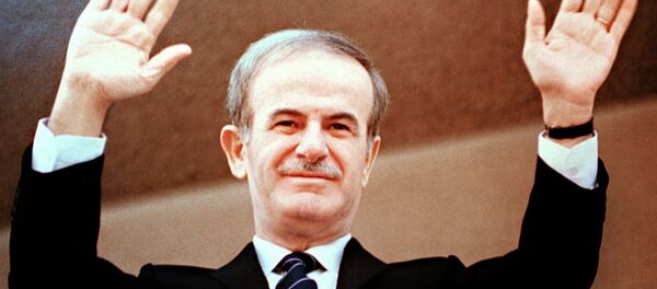 Photo dated 12 March 1985 of late Syrian President Hafez al-Assad acknowledging the crowd after beinb elected to a third seven-year term in front of parliament in Damascus Photo dated 12 March 1985 of late Syrian President Hafez al-Assad acknowledging the crowd after beinb elected to a third seven-year term in front of parliament in Damascus - Sputnik International