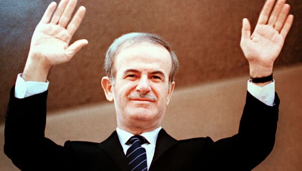 Photo dated 12 March 1985 of late Syrian President Hafez al-Assad acknowledging the crowd after beinb elected to a third seven-year term in front of parliament in Damascus - Sputnik International