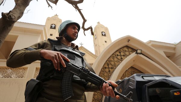 An armed policeman secures the Coptic church that was bombed on Sunday in Tanta, Egypt April 10, 2017 - Sputnik International
