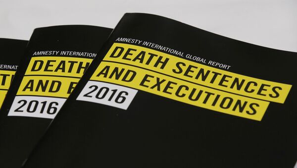 In this Monday, April 10, 2017 photo, the copies of reports on the death penalty are displayed during a press conference of Amnesty International in Hong Kong. - Sputnik International