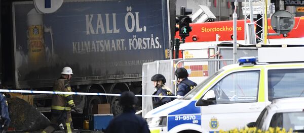 Police cordons the truck which crashed into the Ahlens department store at Drottninggatan in central Stockholm, April 7, 2017 Police cordons the truck which crashed into the Ahlens department store at Drottninggatan in central Stockholm, April 7, 2017 - Sputnik International