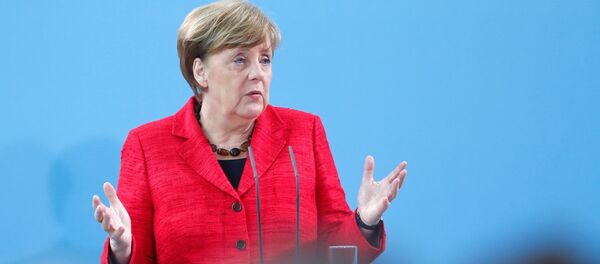 German Chancellor Angela Merkel attends an event that is honouring volunteers who help refugees, in Berlin, Germany, April 7, 2017. German Chancellor Angela Merkel attends an event that is honouring volunteers who help refugees, in Berlin, Germany, April 7, 2017. - Sputnik International