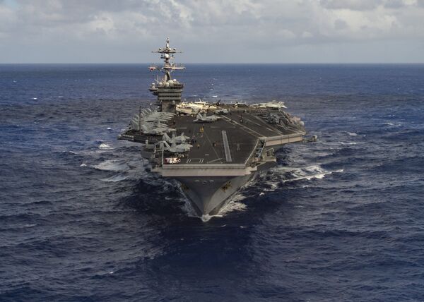 The aircraft carrier USS Carl Vinson (CVN 70) transits the Pacific Ocean January 30, 2017 - Sputnik International