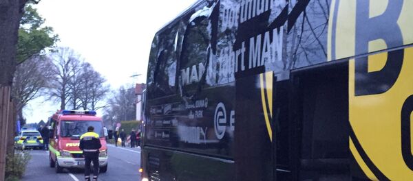 A window of the bus of Borussia Dortmund is damaged after an explosion before the Champions League quarterfinal soccer match against AS Monaco in Dortmund, western Germany, Tuesday, April 11, 2017. - Sputnik International