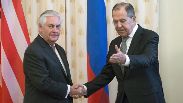 US Secretary of State Rex Tillerson and Russian Foreign Minister Sergey Lavrov, shakes hands prior to their talks in Moscow, Russia, Thursday, April 12, 2017 - Sputnik International