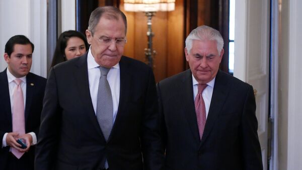 Russian Foreign Minister Sergei Lavrov and U.S. Secretary of State Rex Tillerson enter a hall during their meeting in Moscow, Russia, April 12, 2017 - Sputnik International