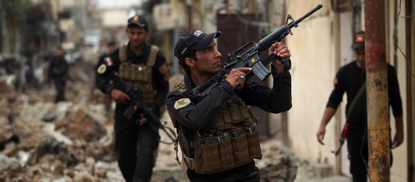 Iraqi counter-terrorism service (CTS) forces advance towards the Sekak neighbourhood in western Mosul on April 11, 2017, during the ongoing offensive to retake the city from Islamic State (IS) group jihadists Iraqi counter-terrorism service (CTS) forces advance towards the Sekak neighbourhood in western Mosul on April 11, 2017, during the ongoing offensive to retake the city from Islamic State (IS) group jihadists - Sputnik International