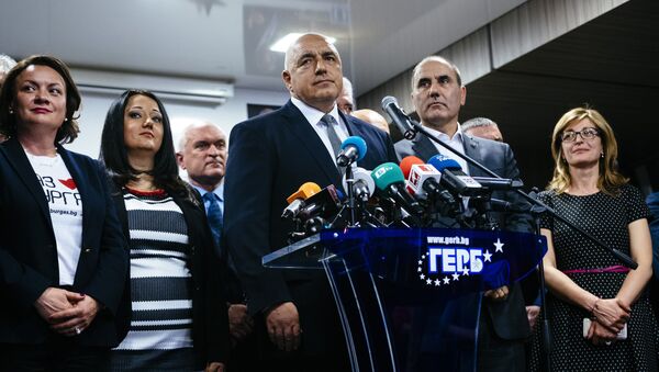 Head of the centre-right GERB party and former prime minister Boyko Borisov (C) speaks to media in Sofia on March 26, 2017, after his party won the country's parliamentary election - Sputnik International