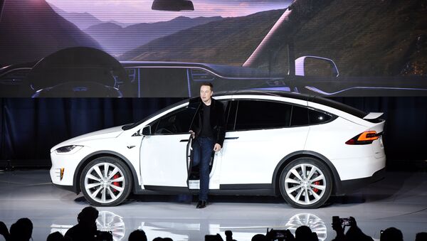Elon Musk, CEO of Tesla Motors Inc., introduces the Model X car at the company's headquarters Tuesday, Sept. 29, 2015, in Fremont, California, US. - Sputnik International