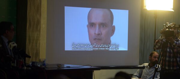 In this photograph taken on March 29, 2016, Pakistani journalists watch a video showing Indian national Kulbhushan Yadav, arrested on suspicion of spying, during a press conference in Islamabad In this photograph taken on March 29, 2016, Pakistani journalists watch a video showing Indian national Kulbhushan Yadav, arrested on suspicion of spying, during a press conference in Islamabad - Sputnik International