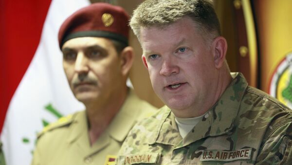Col. John Dorrian, right, a U.S. spokesman for the coalition, speaks during a press conference with Brig. Gen. Yahya Rasool, an Iraqi military spokesman in Baghdad, Iraq, Tuesday, April 11, 2017 - Sputnik International