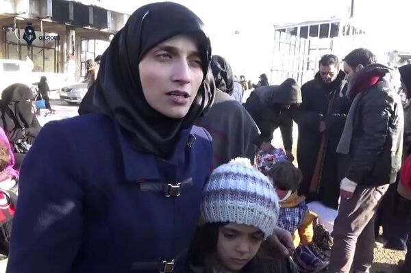 Fatemah Alabed, with her 7-year-old daughter Bana, speaking after they reached the Aleppo countryside following the evacuation of their city, Syria. (File) Fatemah Alabed, with her 7-year-old daughter Bana, speaking after they reached the Aleppo countryside following the evacuation of their city, Syria. (File) - Sputnik International