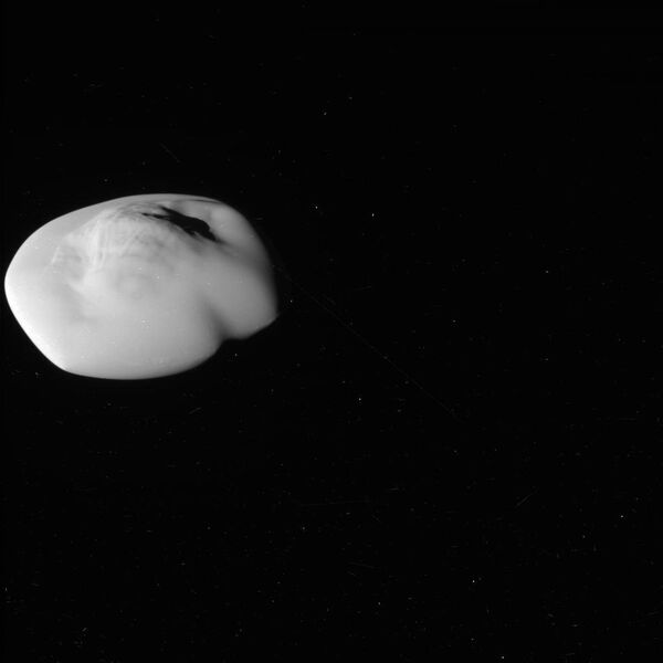 Atlas, the flying saucer moon of Saturn. Photo taken by NASA's Cassini Probe. - Sputnik International
