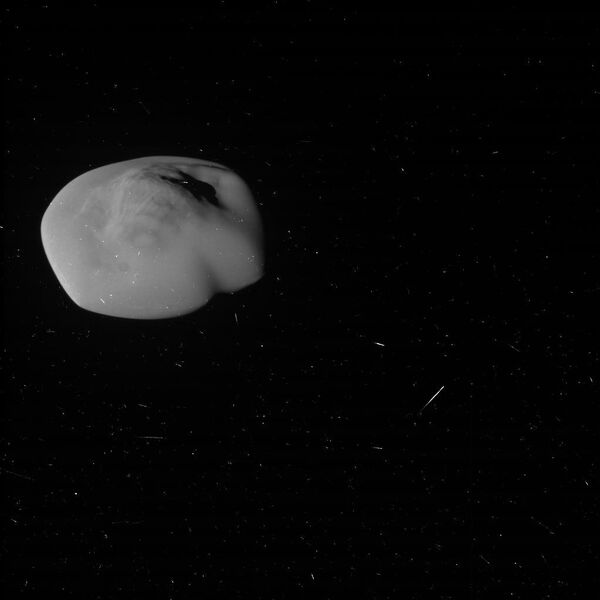 Atlas, the flying saucer moon of Saturn. Photo taken by NASA's Cassini Probe. - Sputnik International