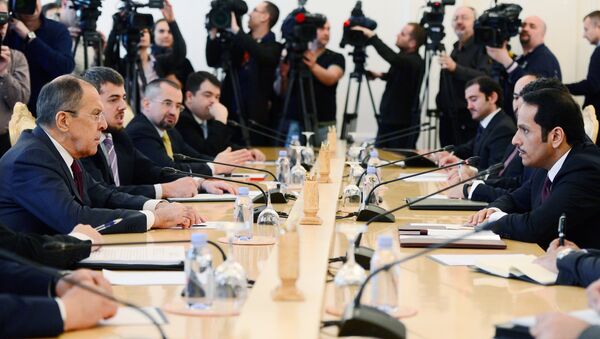 Qatar's Foreign Minister Sheikh Mohammed bin Abdulrahman bin Jassim Al-Thani and Russian Foreign Minister Sergey Lavrov - Sputnik International