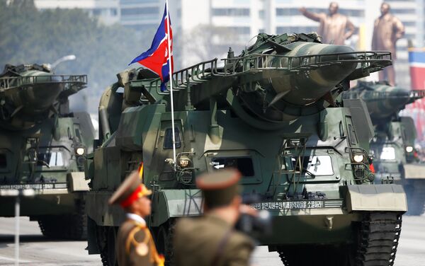 Missiles are driven past the stand with North Korean leader Kim Jong Un and other high ranking officials during a military parade marking the 105th birth anniversary of the country's founding father, Kim Il Sung in Pyongyang, April 15, 2017. - Sputnik International