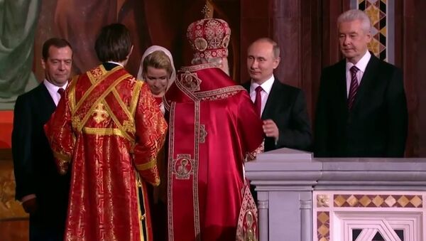 Russian President Putin and Prime Minister Medvedev Attend Easter Mass in Moscow  - Sputnik International