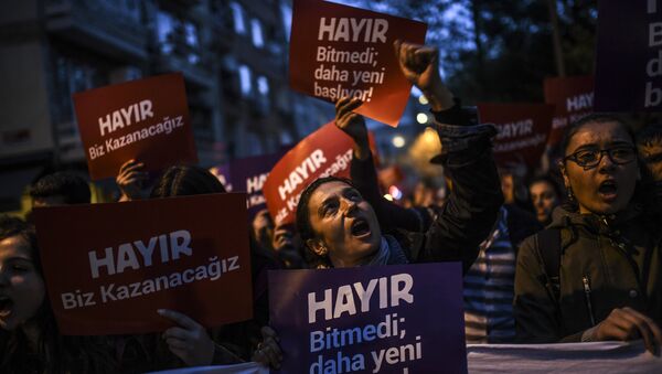 A supporter of the No gestures and chants slogans as he holds a placard reading No during a march at the Kadikoy district in Istanbul on April 17, 2017 to protest following the results in a nationwide referendum that will determine Turkey's future destiny - Sputnik International