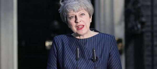 British Prime Minister Theresa May speaks to the media outside 10 Downing Street in central London on April 18, 2017. - Sputnik International