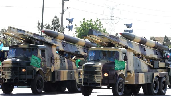 Iranian military trucks carry surface-to-air missiles during a parade on the occasion of the country's Army Day, on April 18, 2017, in Tehran - Sputnik International