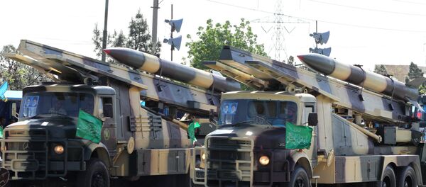 Iranian military trucks carry surface-to-air missiles during a parade on the occasion of the country's Army Day, on April 18, 2017, in Tehran - Sputnik International