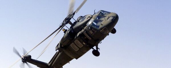 A picture taken 30 October 2000 shows an UH-60 Blackhawk helicopter flying near the Prince Sultan Air Base, Saudi Arabia - Sputnik International
