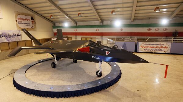 Iran's domestically designed and built Qaher (Conqueror) F-313 fighter jet is unveiled during a ceremony in a warehouse in Tehran on February 2, 2013 - Sputnik International