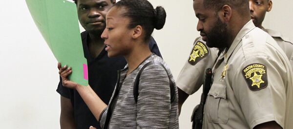 Basil Eleby is escorted by his public defender and two Fulton County Sheriff's office officers into the court room at the Fulton County Jail in Atlanta on Saturday, April 1, 2017. Eleby, accused of starting a raging fire that collapsed a portion of Interstate 85 a few miles north of downtown Atlanta was charged with arson. Basil Eleby is escorted by his public defender and two Fulton County Sheriff's office officers into the court room at the Fulton County Jail in Atlanta on Saturday, April 1, 2017. Eleby, accused of starting a raging fire that collapsed a portion of Interstate 85 a few miles north of downtown Atlanta was charged with arson. - Sputnik International