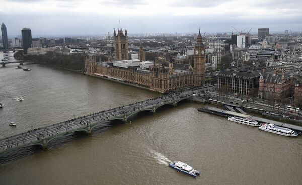 The Palace of Westminster, comprising the House of Commons and the House of Lords, wchich together make up the Houses of Parliament, are pictured on the banks of the River Thames alongside Westminster Bridge in central London on March 29, 2017 The Palace of Westminster, comprising the House of Commons and the House of Lords, wchich together make up the Houses of Parliament, are pictured on the banks of the River Thames alongside Westminster Bridge in central London on March 29, 2017 - Sputnik International