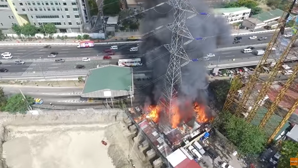 Tower Engulfed in Flames Collapses - Sputnik International