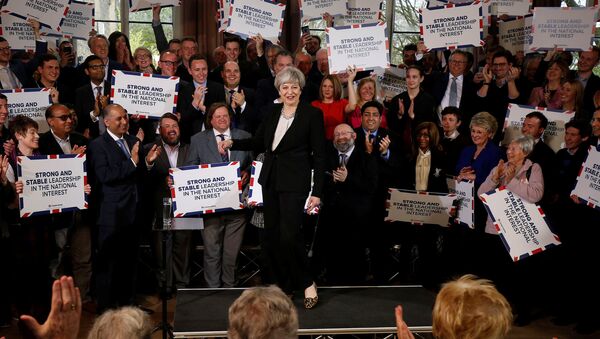 Britain's Prime Minister Theresa May delivers a speech to Conservative Party members to launch their election campaign in Walmsley Parish Hall, Bolton, Britain April 19, 2017 - Sputnik International
