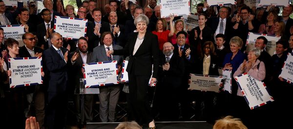 Britain's Prime Minister Theresa May delivers a speech to Conservative Party members to launch their election campaign in Walmsley Parish Hall, Bolton, Britain April 19, 2017 - Sputnik International