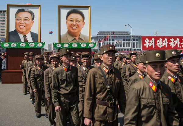 Portraits of Kim Il-sung and Kim Jong-il at a ceremony to open a new residential area on Ryomyong Street in Pyongyang. Portraits of Kim Il-sung and Kim Jong-il at a ceremony to open a new residential area on Ryomyong Street in Pyongyang. - Sputnik International