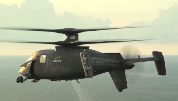 The S-97 Raider, Sikorsky's newest light tactical helicopter, withdrawing its landing wheels during a video demonstration. - Sputnik International
