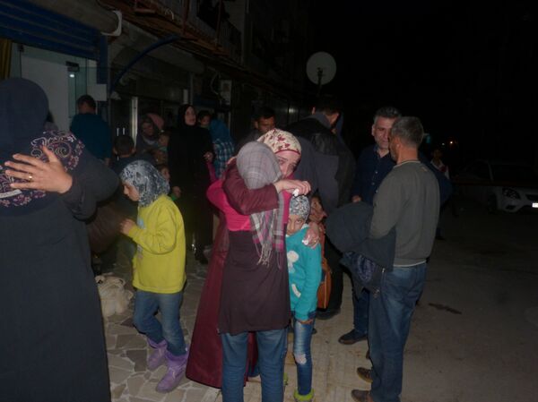 Survivors of attack in Rashidin, Syria - Sputnik International