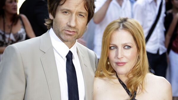 US actors David Duchovny, left, and Gillian Anderson, right, arrive for the British premiere of The X Files: I Want To Believe, in central London, Wednesday, July 30, 2008. - Sputnik International