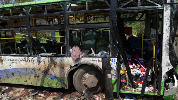 A damaged bus is seen after an explosion at al-Rashideen, Aleppo province, Syria April 15, 2017. - Sputnik International