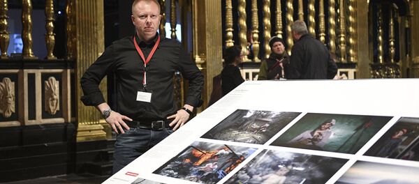 Valery Melnikov, Sputnik photojournalist and winner of multiple leading international photography contests at 2017 World Press Photo exhibition. Valery Melnikov, Sputnik photojournalist and winner of multiple leading international photography contests at 2017 World Press Photo exhibition. - Sputnik International