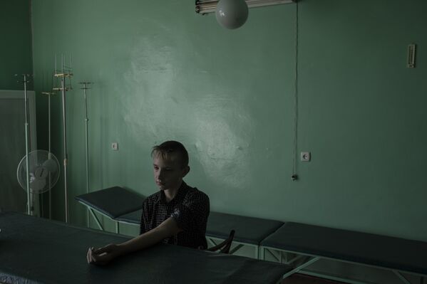 Another  photo from World Press Photo award-winning series by Sputnik photojournalist Valery Melnikov Black Days of Ukraine. - Sputnik International