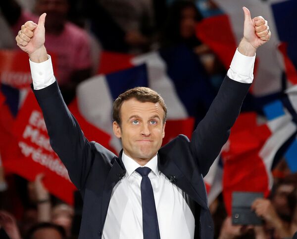 Emmanuel Macron, head of the political movement En Marche !, or Onwards !, and candidate for the 2017 French presidential election, attends a campaign political rally at the AccorHotels Arena in Paris, France, April 17, 2017. Emmanuel Macron, head of the political movement En Marche !, or Onwards !, and candidate for the 2017 French presidential election, attends a campaign political rally at the AccorHotels Arena in Paris, France, April 17, 2017. - Sputnik International
