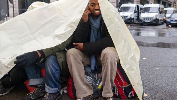 Migrant jungle camp cleared out in Paris - Sputnik International