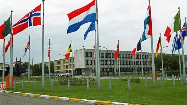 NATO member states' flags outside the European headquarters of the North Atlantic Treaty Organization in Brussels. (File) - Sputnik International