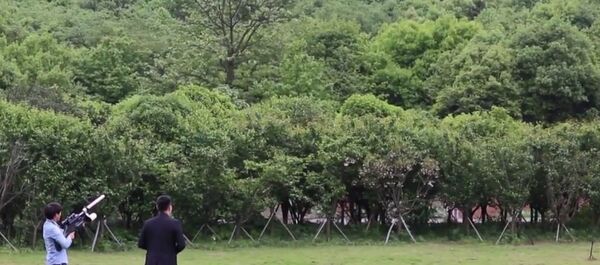 Hunting UAVs: Chinese Inventors Show How Anti-Drone Gun Works Hunting UAVs: Chinese Inventors Show How Anti-Drone Gun Works - Sputnik International