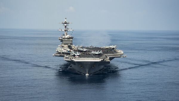 The aircraft carrier USS Carl Vinson transits the South China Sea while conducting flight operations on April 9, 2017. - Sputnik International